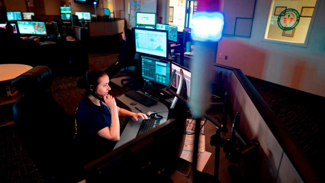 PHOTO: A dispatcher with Anne Arundel County Fire Department  answers a 911 emergency call from their department dispatch center, April 14, 2020, in Glen Burnie, Md. (Alex Edelman/AFP via Getty Images, FILE)