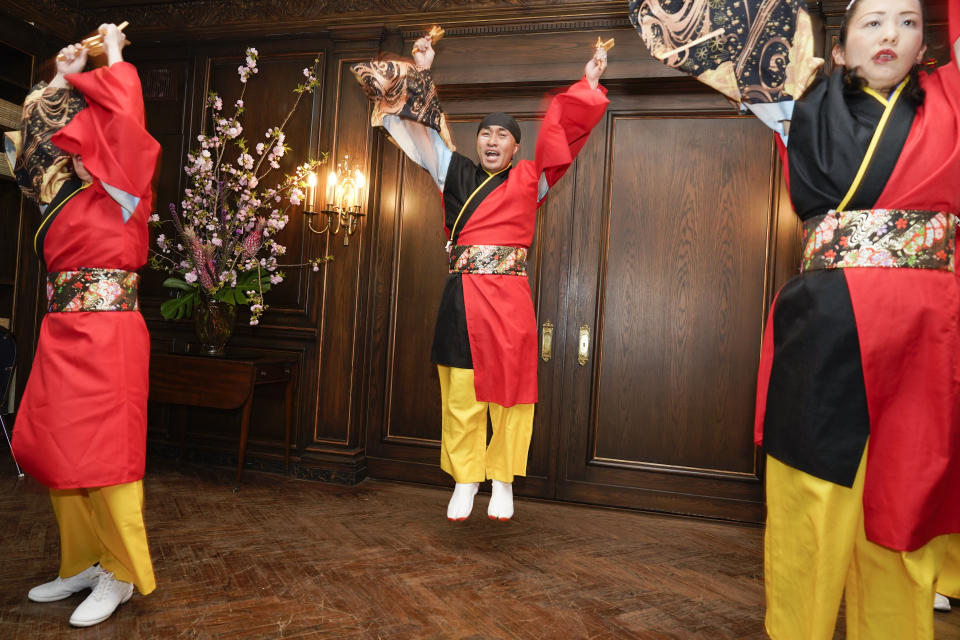 Kazanami Yosakoi Dance Project performs during a news conference in New York, Wednesday, April 27, 2022. Performers and Japanese officials were promoting the first ever Japan Parade, celebrating Japanese culture and tradition, which will take place in New York on Saturday, May 14, 2022. (AP Photo/Seth Wenig)