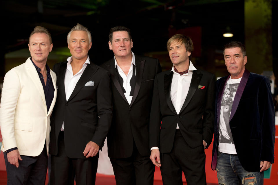 Members of the British band of Spandau Ballet, from left, Gary Kemp, Martin Kemp, Tony Hadley, Steve Norman and John Keeble arrive for the screening of the documentary 'Soul Boys of the Western World', in Rome, Monday, Oct. 20, 2014. (AP Photo/Andrew Medichini)