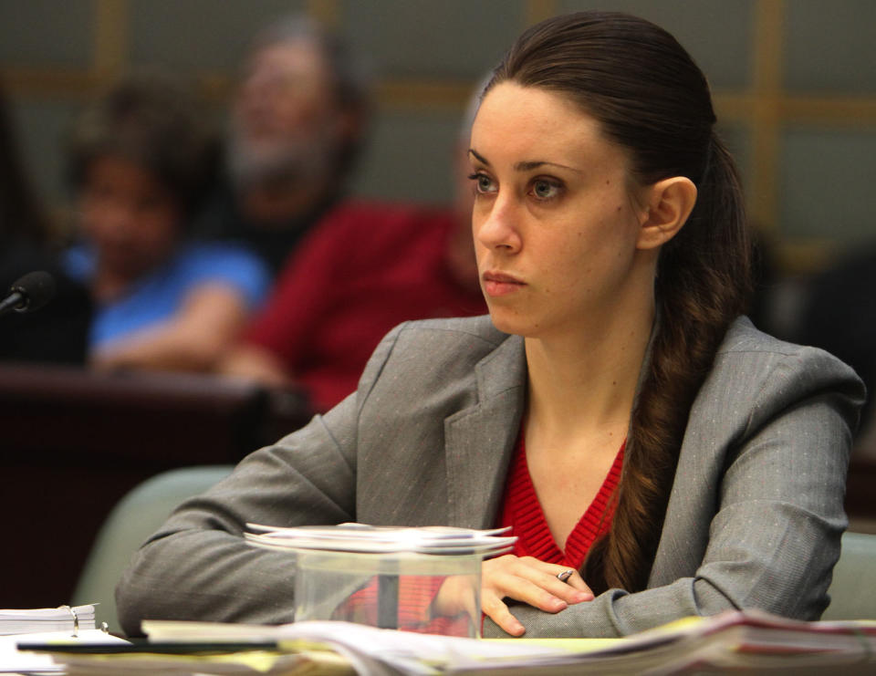 FILE - In this March 3, 2011, file photo, Casey Anthony, 24, listens to testimony during the last day of hearings during her murder trial, in Orlando, Fla. The case transfixed the nation, and many were angry when Anthony was acquitted of murdering her 2-year-old daughter. (AP Photo/Red Huber, Pool, File)