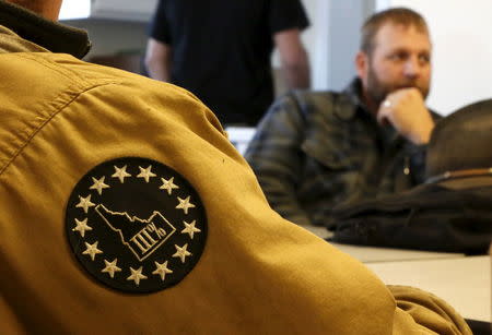 A member of the Pacific Patriot Network wears a patch of the Idaho Three Percent during a meeting with Ammon Bundy at the Malheur National Wildlife Refuge near Burns, Oregon, January 8, 2016. REUTERS/Jim Urquhart