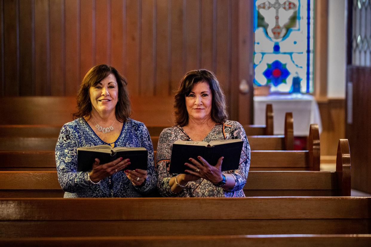 Stacy Nelson, left, and her twin sister, Tracy Nelson, sit in the pew their family has used for nearly 60 years at St. Alban's Episcopal Church in Auburndale. The church, which held its first worship service on Sept. 28, 1898, is celebrating its 125th anniversary.