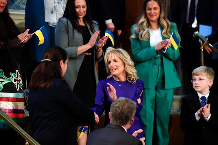 First lady Jill Biden greets her guest Ukraine Ambassador to the United States, Oksana Markarova as Markarova arrives in the first lady&#39;s box in the chamber of the House of Representatives before the State of the Union address by President Joe Biden to a joint session of Congress at the Capitol, Tuesday, March 1, 2022, in Washington.