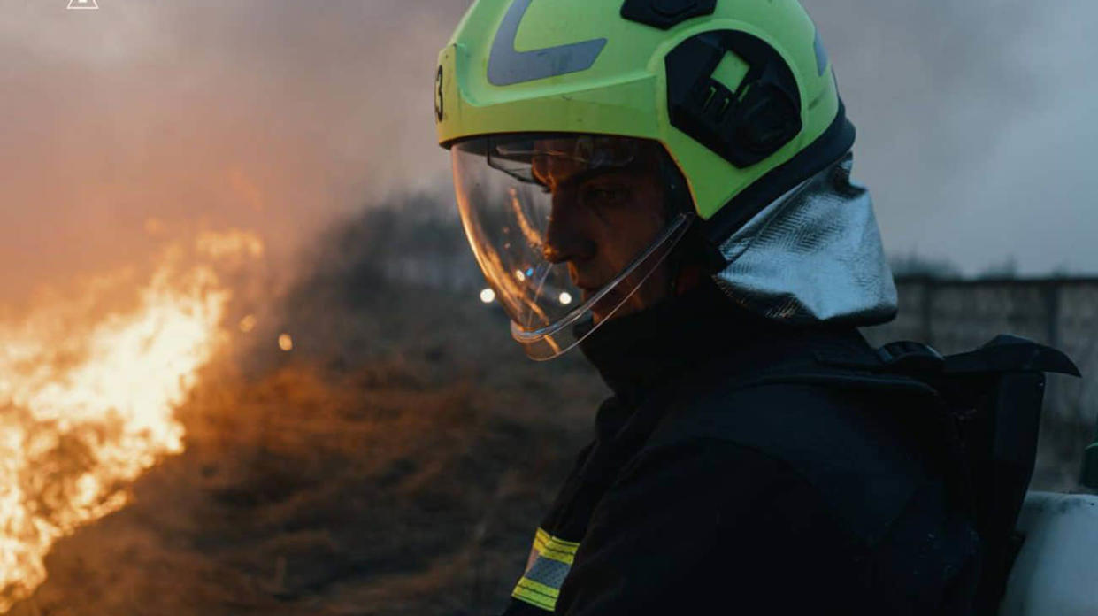 A firefighter extinguishing a fire. Stock photo: State Emergency Service of Ukraine