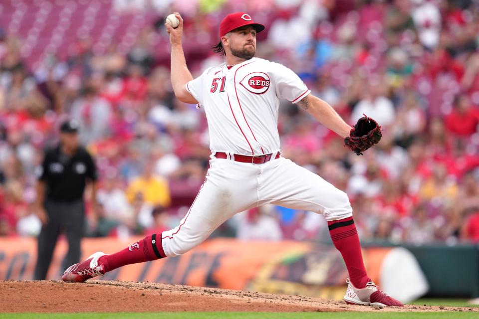 Cincinnati Reds starting pitcher Graham Ashcraft throws during the third inning of the team's baseball game against the New York Mets on Wednesday, July 6, 2022, in Cincinnati.