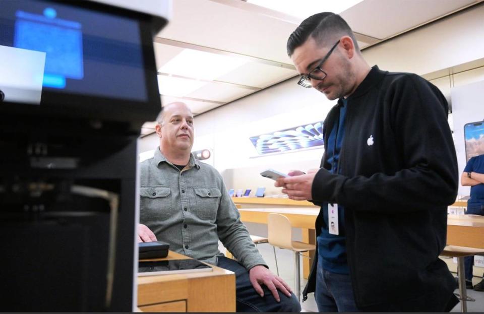 An Apple Store employee begins a personal demonstration of Apple’s new Vision Pro goggles by determining Bee columnist Marek Warszawski’s eyeglass prescription Tuesday, Feb 13, 2024 in Fresno.