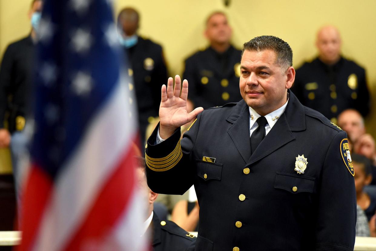 Deputy Chief Englebert Ribeiro takes the oath of office for his new rank as deputy chief during a promotional ceremony for the Paterson Police Department at City Hall on August 2, 2021. Mayor Andre Sayegh, not pictured, delivers the oath of office.