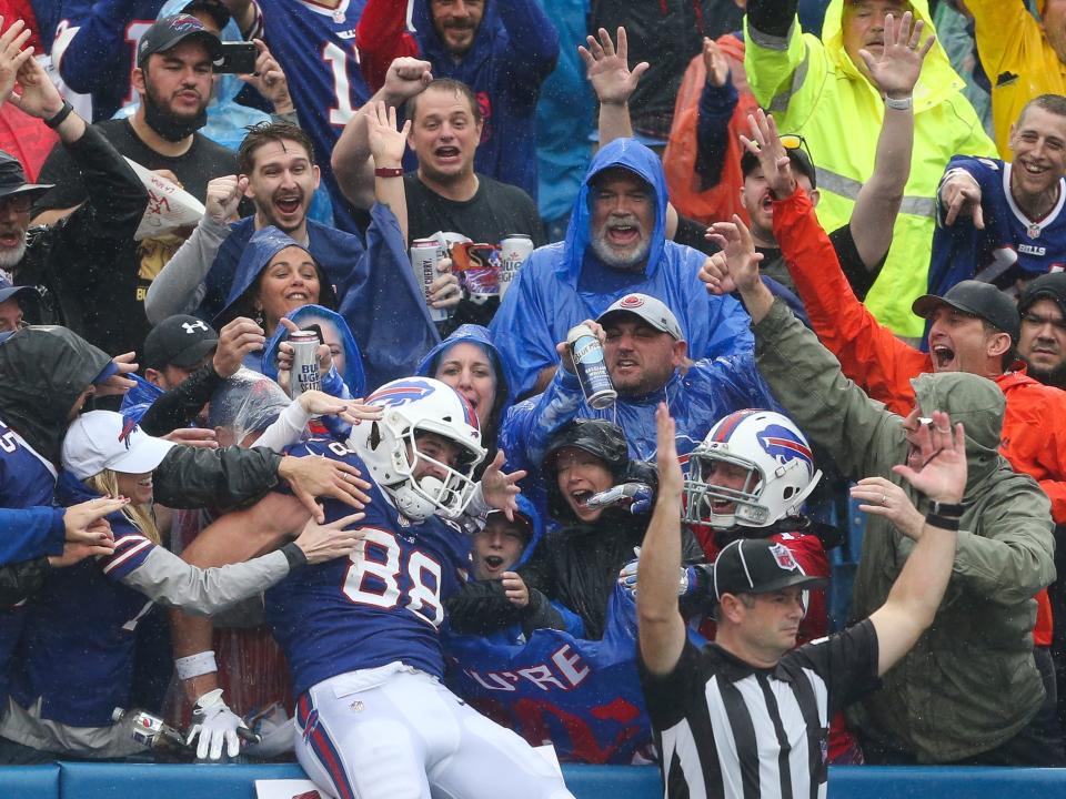 Dawson Knox celebrates a touchdown against the Houston Texans.