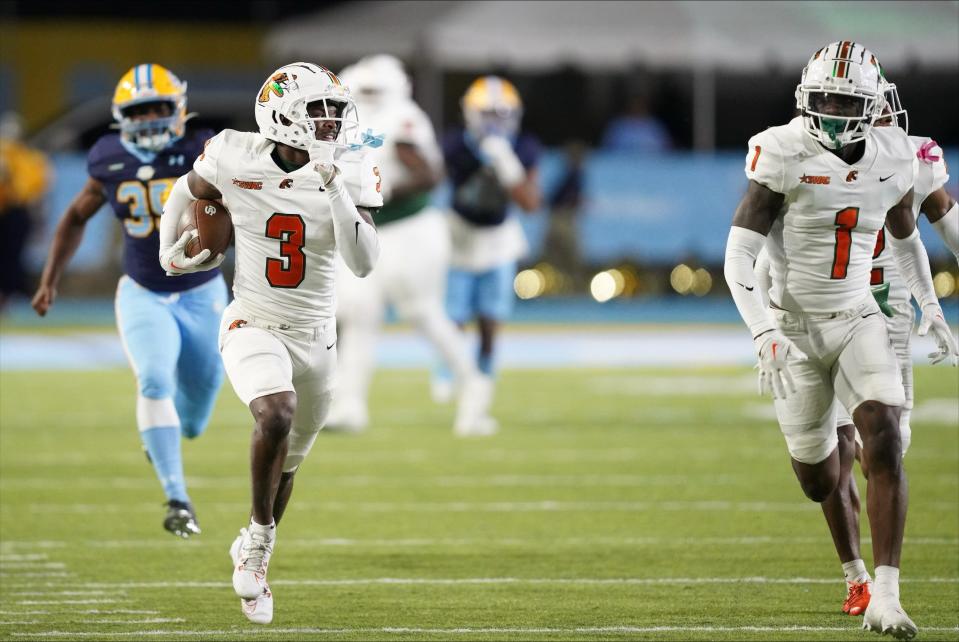 Florida A&M Rattlers quarterback Kendall Bohler returns a blocked Southern Jaguars PAT by defensive back Lovie Jenkins for a touchdown in a Southwestern Athletic Conference game at AW Mumford Stadium in Baton Rouge, Louisiana, Saturday, Oct. 7, 2023.