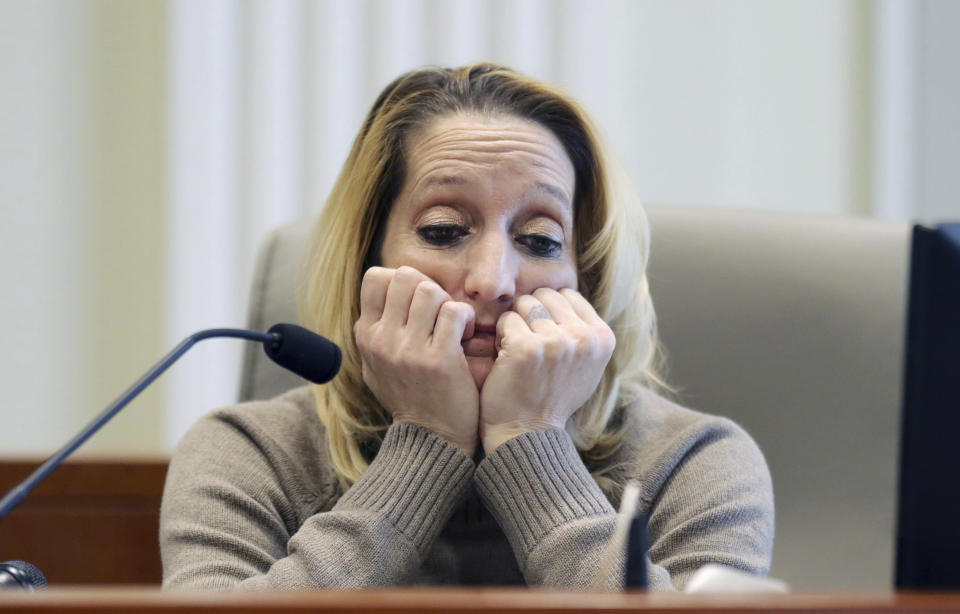 Lisa Britt pauses before answering a question during the public evidentiary hearing on the 9th Congressional District investigation at the North Carolina State Bar Monday, Feb. 18, 2019, in Raleigh, N.C. (Juli Leonard/The News & Observer via AP, Pool)