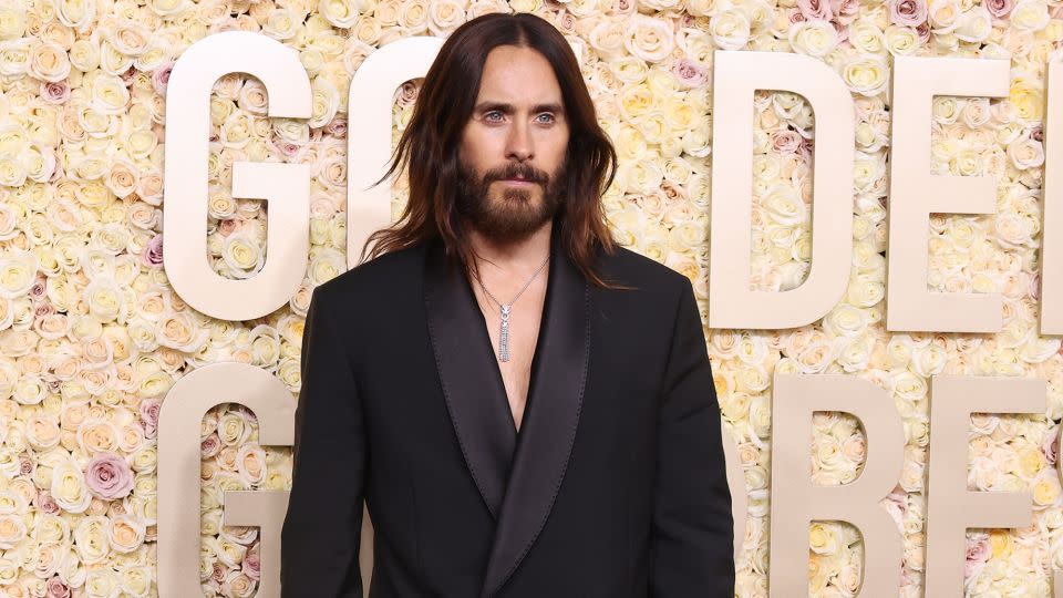 Jared Leto wore an outfit from Givenchy’s Spring-Summer 2024 collection — and his black leather gloves caused a stir online, with social media users comparing him to a hitman or cult leader. - Amy Sussman/Getty Images