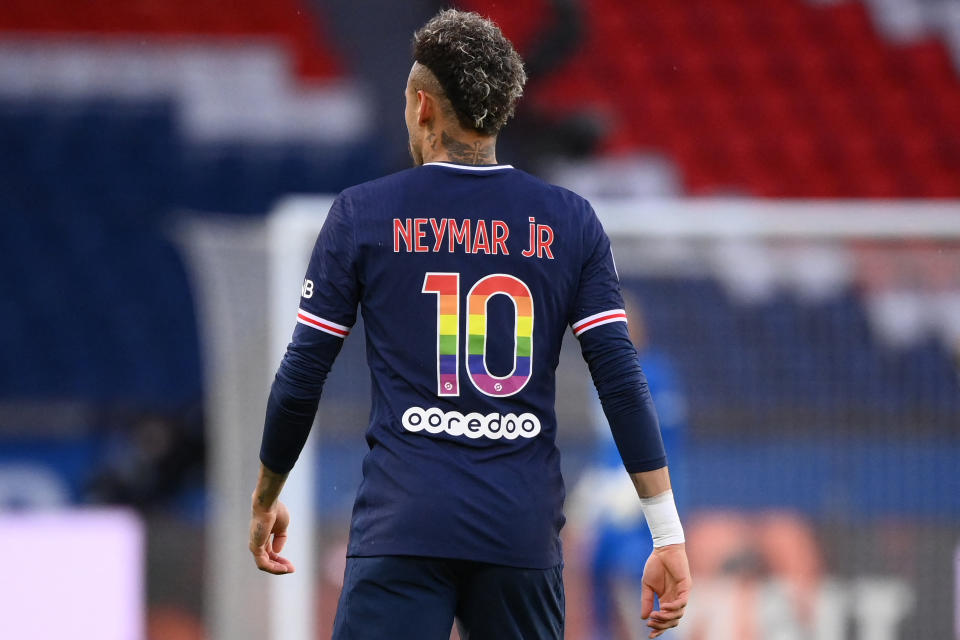 Paris Saint-Germain's Brazilian forward Neymar, wearing a jersey in the colour of the Rainbow flag marking the fight against homophobia, walks on the pitch during the French L1 football match between Paris Saint-Germain and Stade de Reims at the Parc des Princes stadium in Paris on May 16, 2021. - The 37th day of Ligue 1 on May 16 was an opportunity for French football to raise public awareness about the fight against homophobia, through various operations in the stadiums. (Photo by FRANCK FIFE / AFP) (Photo by FRANCK FIFE/AFP via Getty Images)