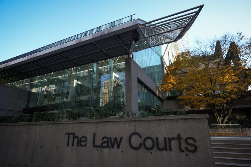 A British Columbia Supreme Court judge has rejected an application to exclude the father of a murdered 13-year-old girl from following post-trial proceedings. The Law Courts building, which is home to B.C. Supreme Court and the Court of Appeal, is seen in Vancouver, on Thursday, Nov. 23, 2023. 