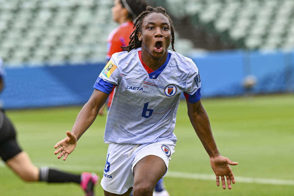Melchie Dumonay of Haiti celebrates after scoring her team's first goal during their FIFA women's World Cup qualifier against Chile in Auckland, New Zealand, Wednesday, Feb. 22, 2023. (Andrew Cornaga/Photosport via AP)