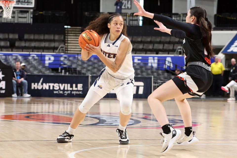 Mahri Petree looks for a passing lane against Sam Houston Tuesday in Huntsville, Ala.