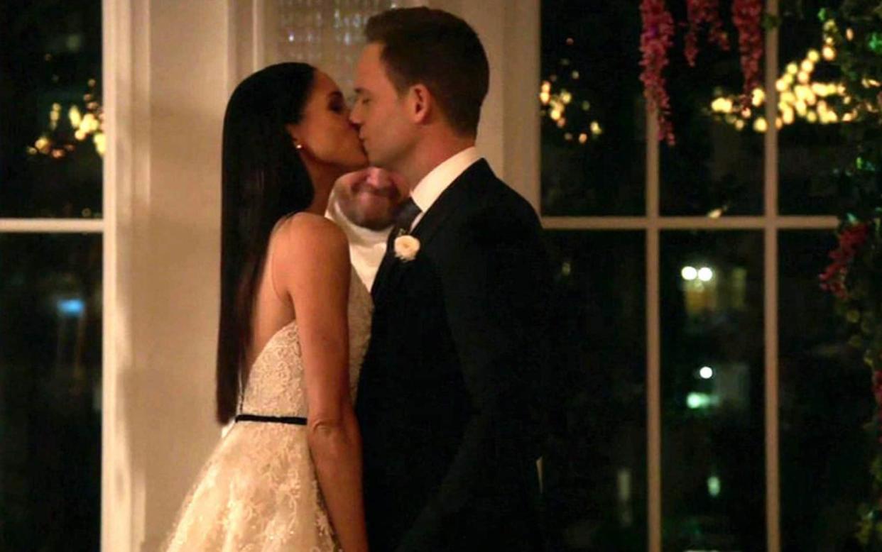 Meghan Markle and Patrick J Adams in Suits - BACKGRID