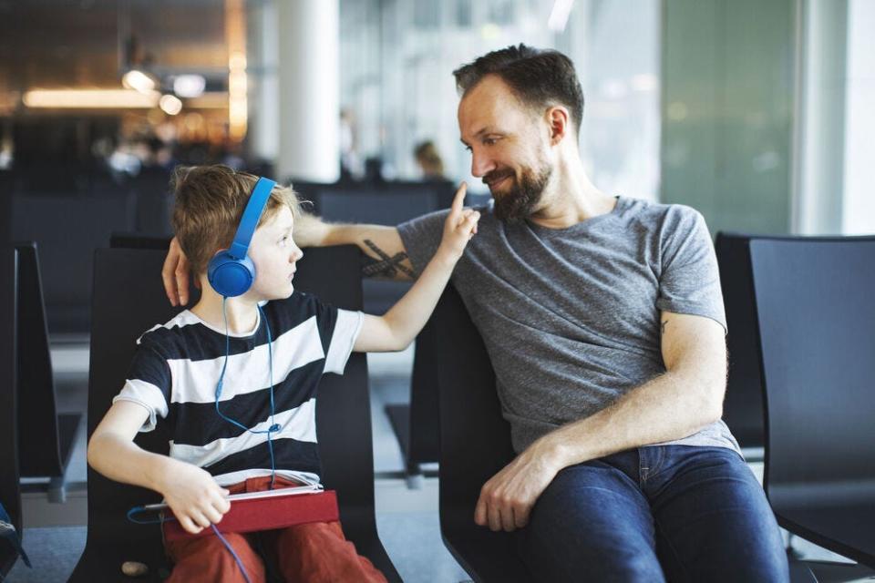 Noise-cancelling headphones can be helpful during autism-friendly vacations