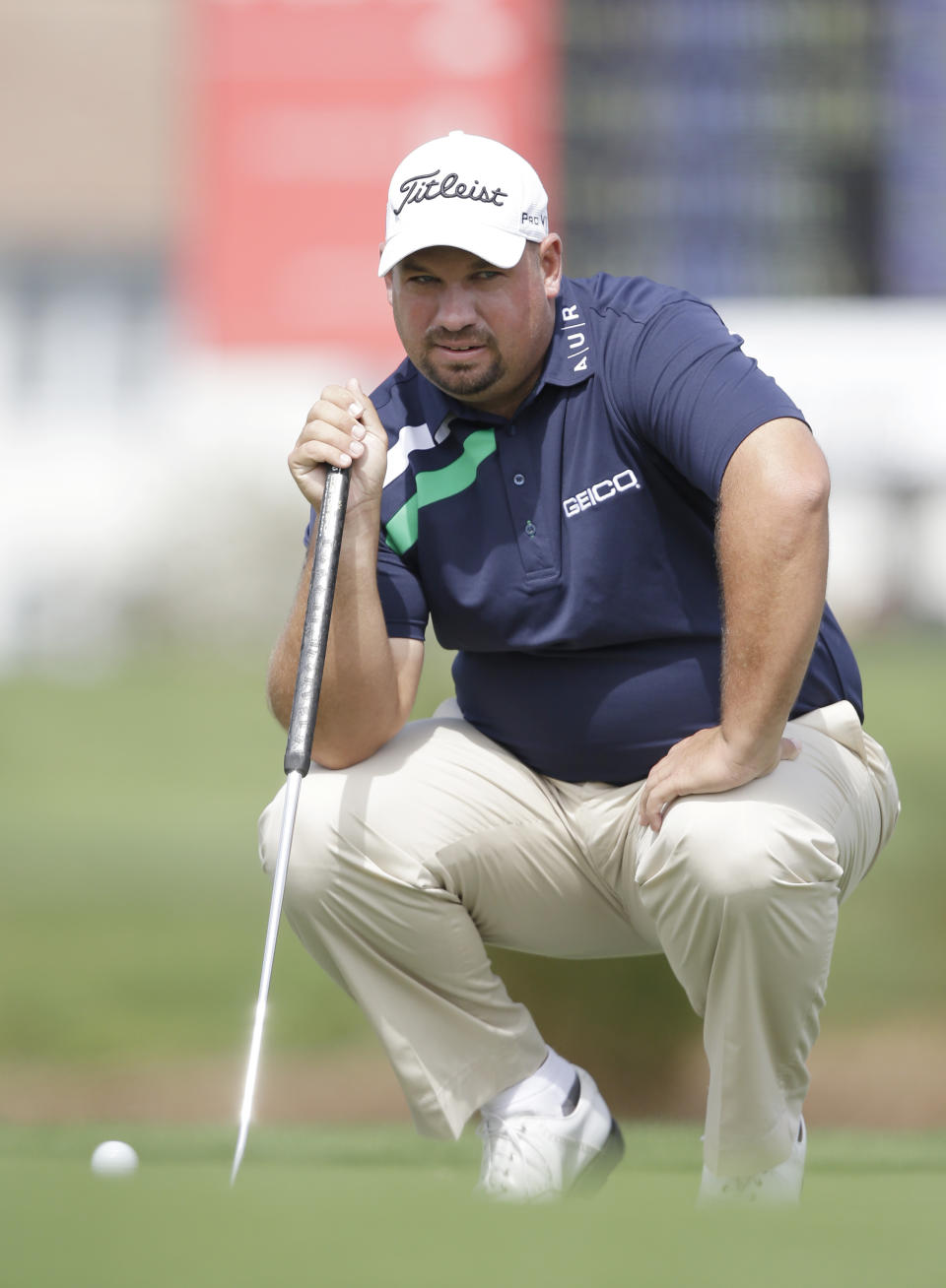 Golfer Brendon de Jonge of Zimbabwe lines up his shot on 11th hole the during the second round of the Honda Classic golf tournament, Friday, Feb. 28, 2014 in Palm Beach Gardens, Fla. (AP Photo/Wilfredo Lee)