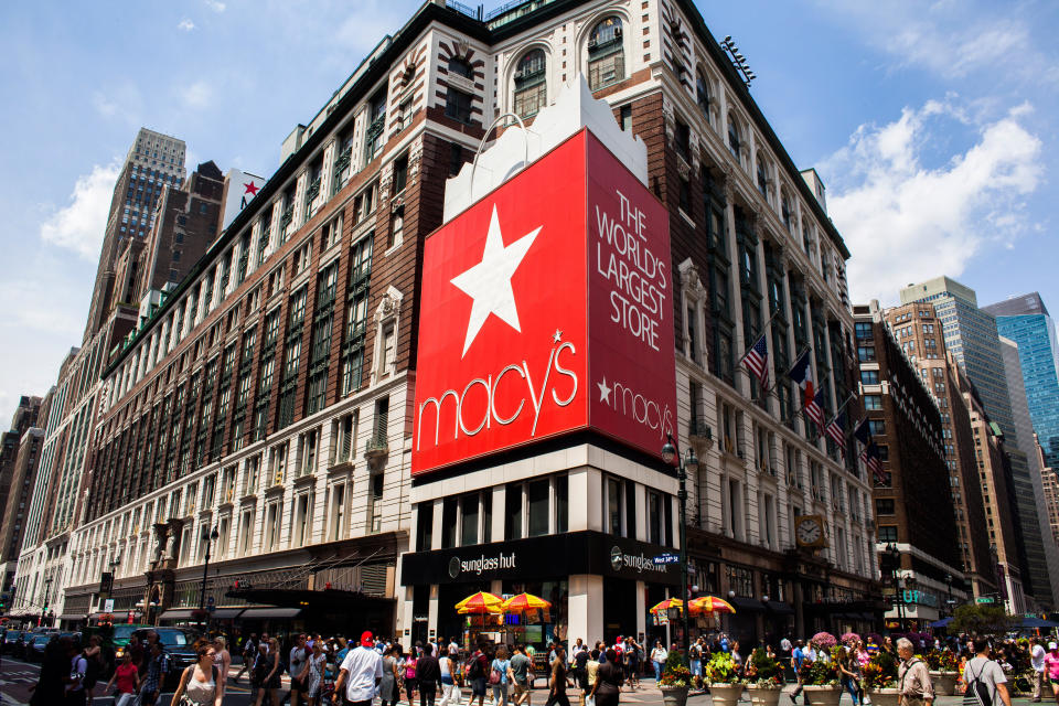 Pedestrians and shoppers pass in front of a Macy’s Inc. store in New York, U.S., on Monday, July 18, 2016. (David Williams/Bloomberg via Getty Images)