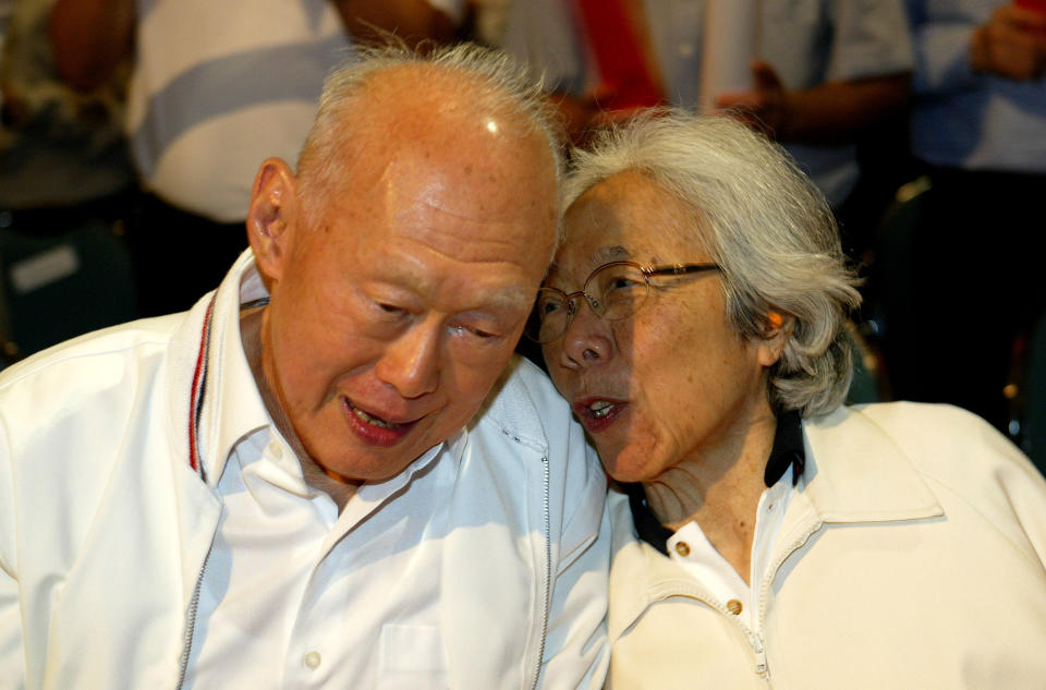 FILE - In this May 1, 2006, file photo, Singapore&#39;s then Minister Mentor Lee Kuan Yew, left, shares a light moment with his wife, Kwa Geok Choo, right, during the Labour Day Rally in Singapore. Lee Kuan Yew, the founder of modern Singapore who helped transform the sleepy port into one of the world&#39;s richest nations, died Monday, March 23, 2015, the government said. He was 91. (AP Photo/Wong Maye-E, File)