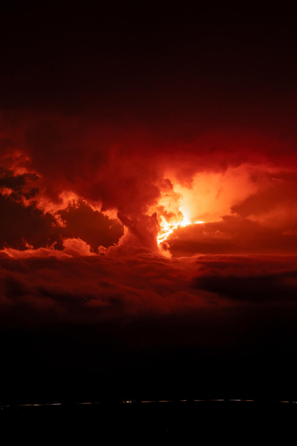 An image of Hawaii's Mauna Loa volcano erupting