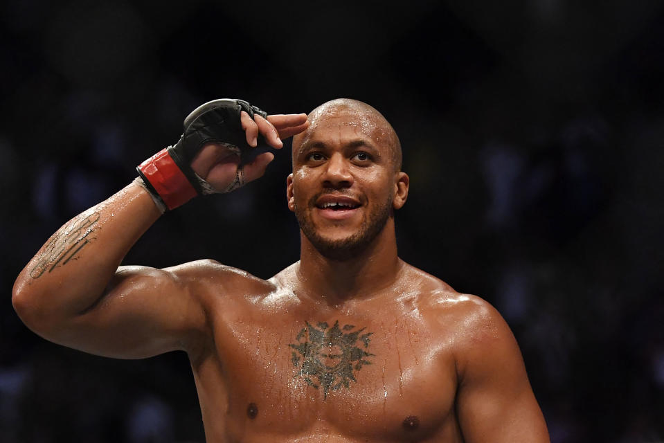 French fighter Ciryl Gane celebrates after defeating Australian fighter Tai Tuivasa in their men's heavyweight fight during the Ultimate Fighting Championship (UFC) event at the Accor Arena in Paris, on September 3, 2022. (Photo by JULIEN DE ROSA / AFP) (Photo by JULIEN DE ROSA/AFP via Getty Images)