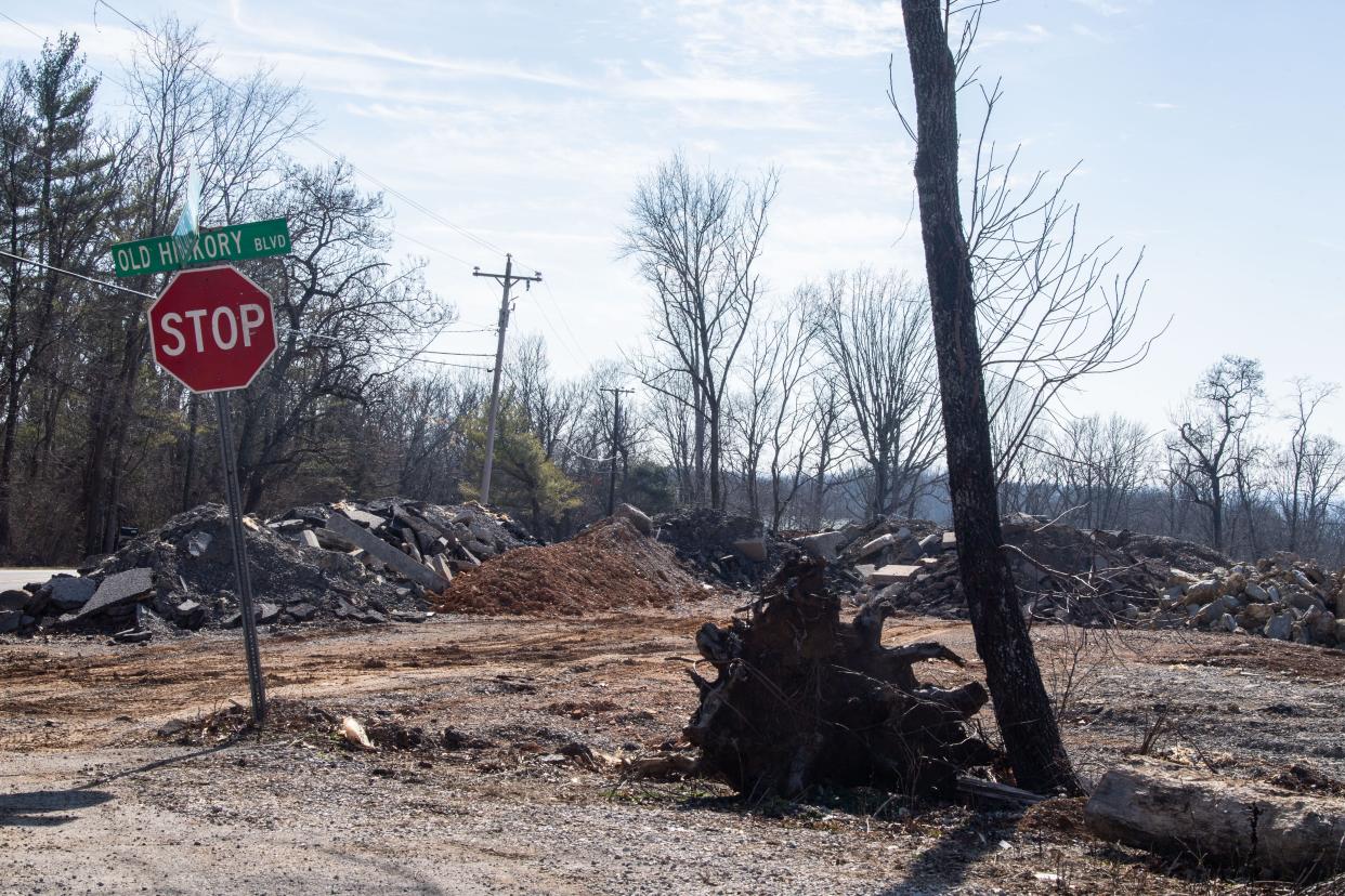 Chunks of stone and concrete are seen off Old Hickory Boulevard near Beaman Park in Nashville, Tenn., Tuesday, Feb. 6, 2024.