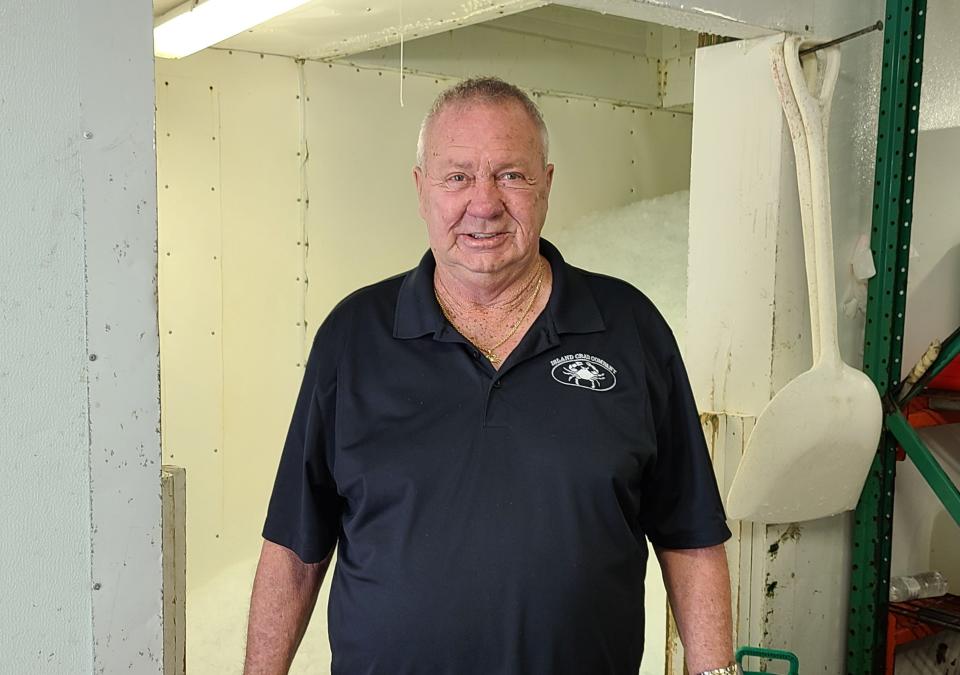 Jeff Haugland is the founder and co-owner of Island Crab Co. in front of the ice room.