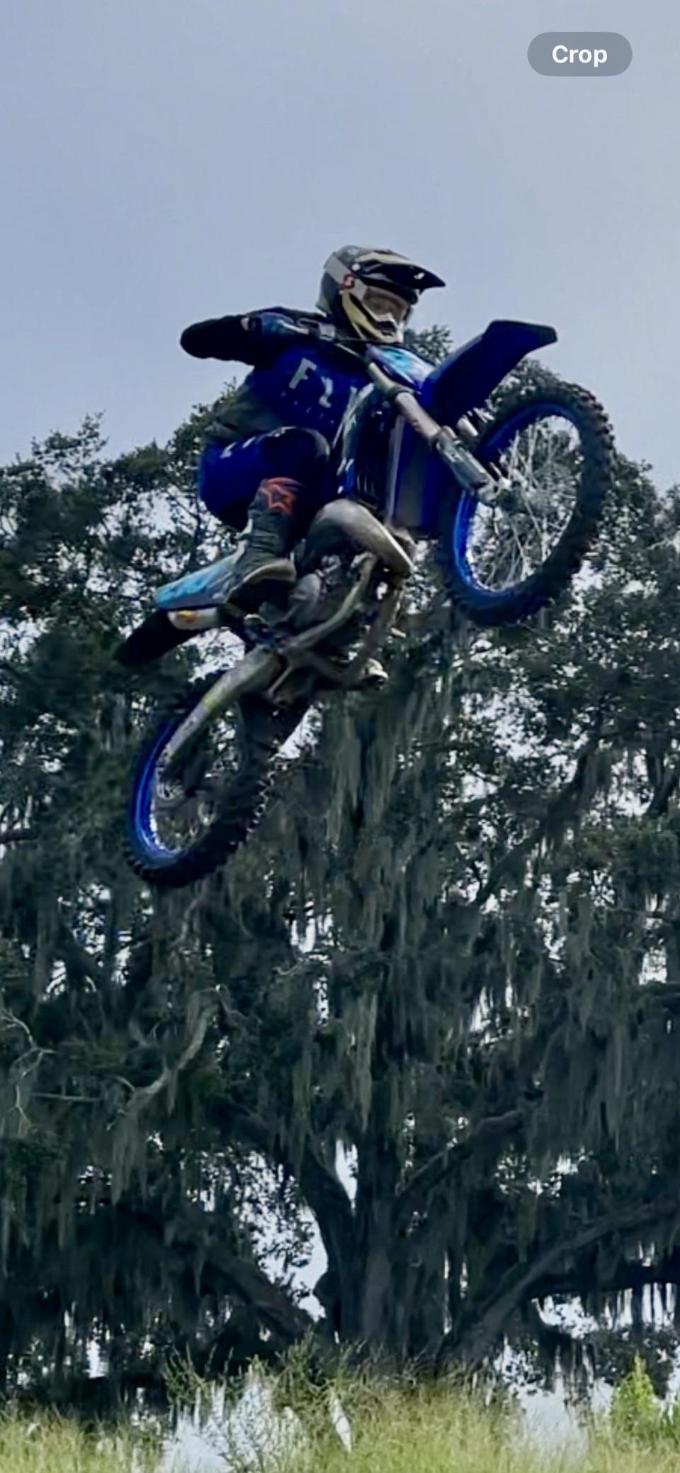Paxton Zivitski, 13, of Ormond Beach, makes a 50-foot leap at a private motocross track on Sept. 12. Paxton was one of 7 boys from Volusia and Putnam counties training to ride dirt bikes and getting ready for competitions.
