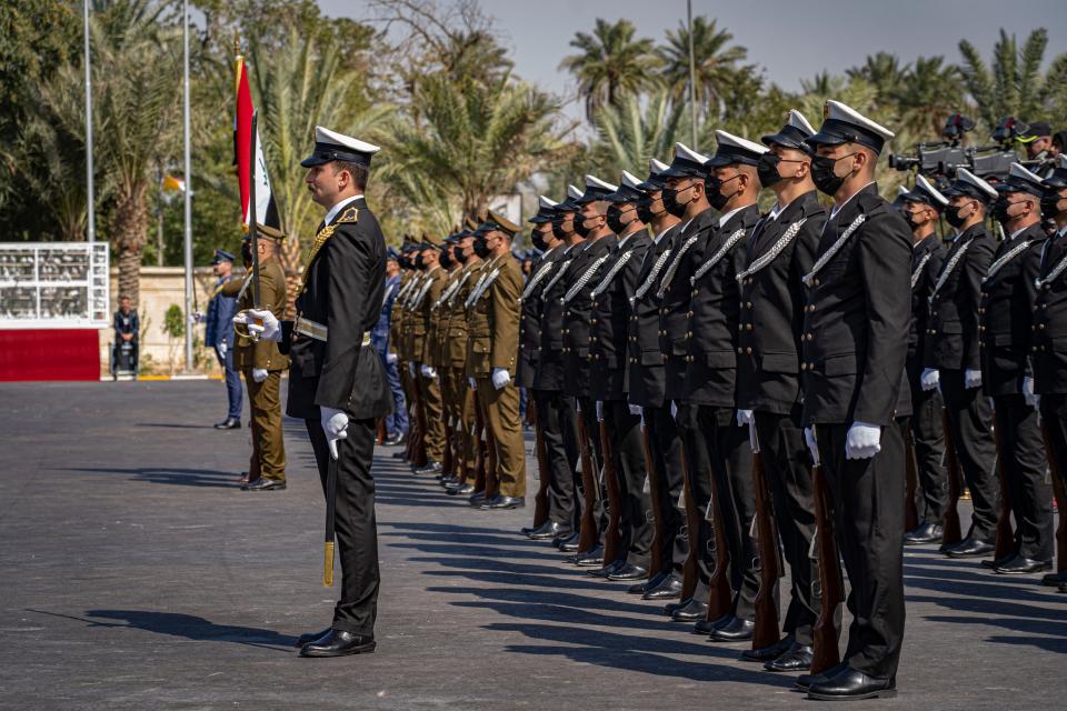 Guards at the presidential palace greet Pope Francis on his first visit to IraqBel Trew