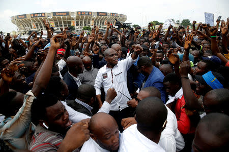 Martin Fayulu, runner-up in Democratic Republic of Congo's presidential election gestures to his supporters as he arrives to a political rally in Kinshasa, Democratic Republic of Congo, January 11, 2019. REUTERS/Baz Ratner