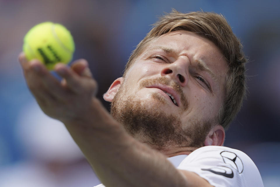 David Goffin, of Belgium, serves to Richard Gasquet, of France, during the Western & Southern Open tennis tournament, Saturday, Aug. 17, 2019, in Mason, Ohio. (AP Photo/John Minchillo)