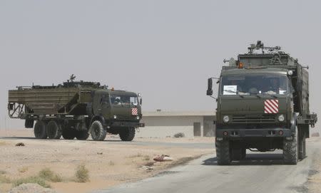 Russian trucks seen on the road heading to Deir al-Zor in Kabakeb near Deir al-Zor, Syria September 21, 2017. REUTERS/Omar Sanadiki