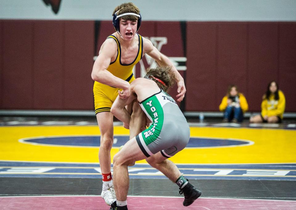 Delta's Neal Mosier and Yorktown's Carter Overby wrestling in the 120 pound weight class during the Delaware County Wrestling Tournament at Wes-Del High School Thursday, Jan. 6, 2022. 