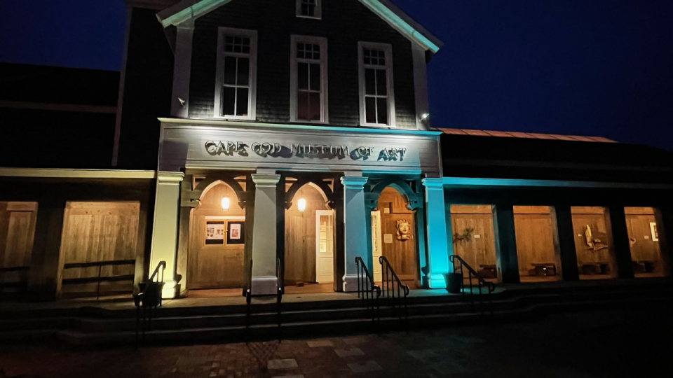 Cape Cod Museum of Art displays blue and yellow lights, the colors of the Ukrainian flag, in support of the country and its people, in March.