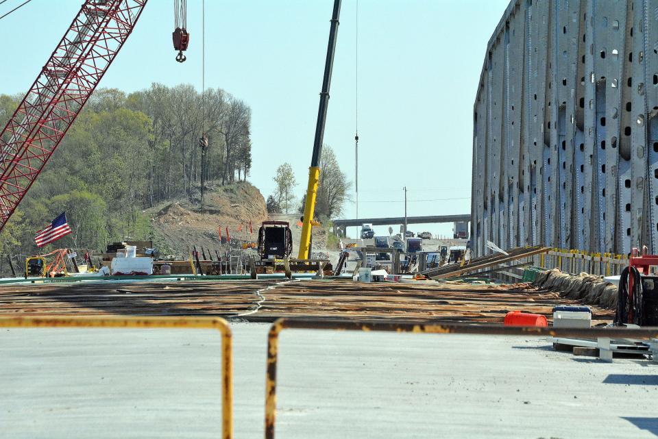 Construction continues to progress on the Lance Cpl. Leon Deraps I-70 Missouri River Bridge at Rocheport. Workers are making their way toward the center of the bridge deck with the first of two bridges likely opening by the summer. 