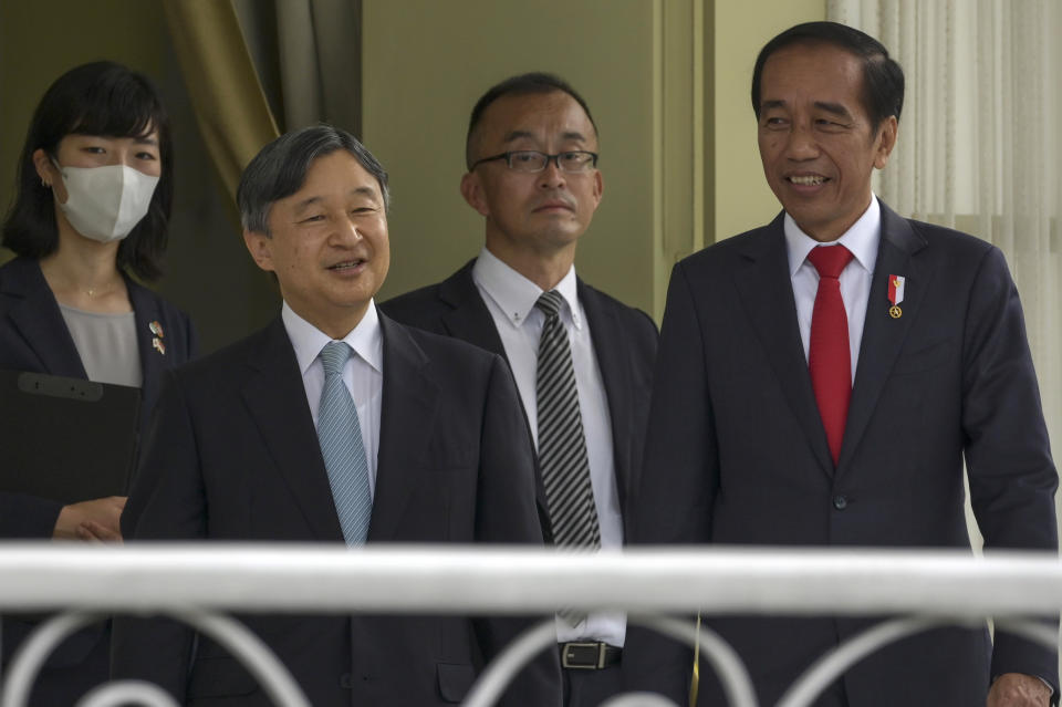 Indonesian President Joko Widodo, right, walks with Japan's Emperor Naruhito, second left, during their meeting at Bogor Palace in Bogor, West Java, Indonesia, Monday, June 19, 2023. (Bay Ismoyo/Pool Photo via AP)