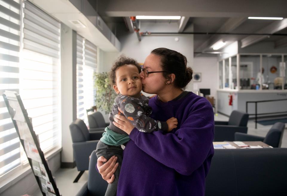 Sarah Wilkinson, holding her 1-year-old son, Joseph, has been staying at The Haven of Portage County for about a month.