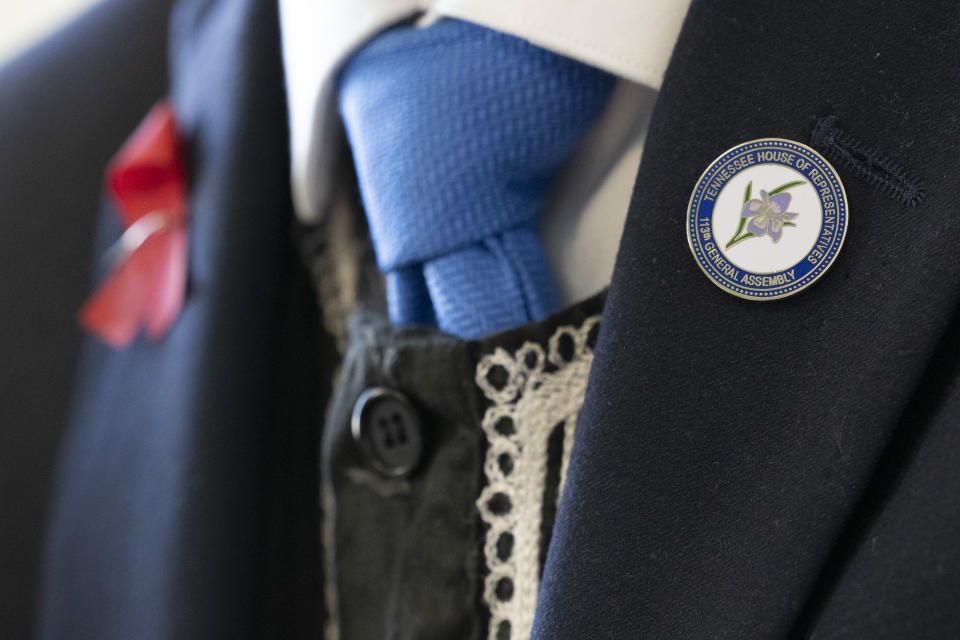 State Rep. Justin Pearson, D-Memphis, wears his legislative pin on his lapel as he responds to questions during an interview at his office Monday, April 17, 2023, in Nashville, Tenn. (AP Photo/George Walker IV)