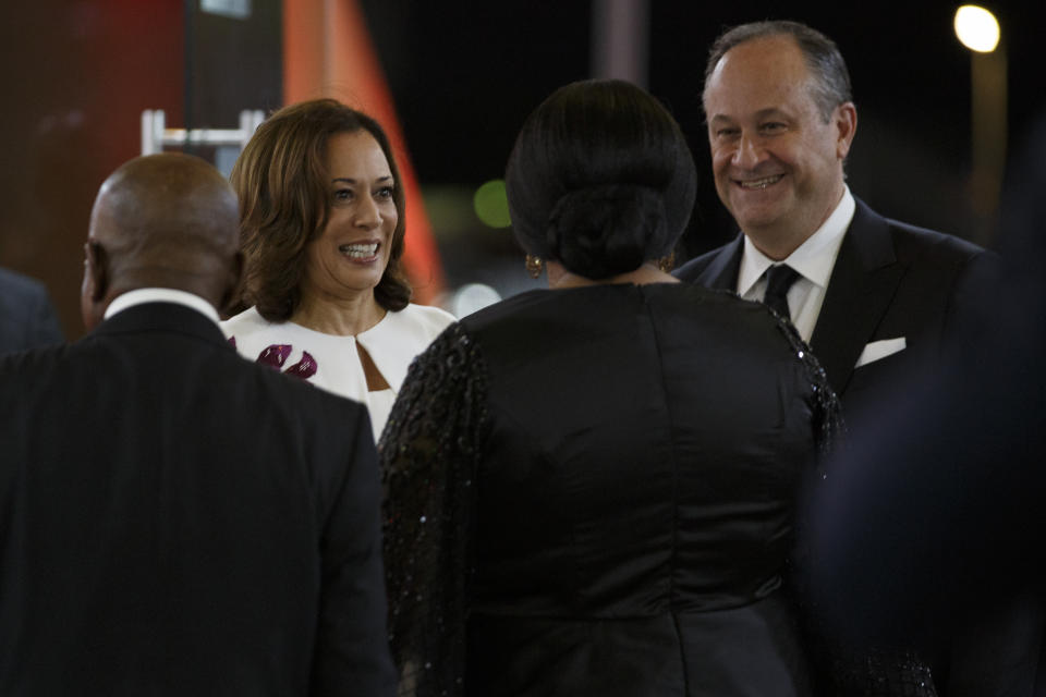 U.S. Vice President Kamala Harris and Second Gentleman Douglas Emhoff arrive at a state banquet in Accra, Ghana, Monday March 27, 2023. Harris is on a seven-day African visit that will also take her to Tanzania and Zambia. (AP Photo/Misper Apawu)