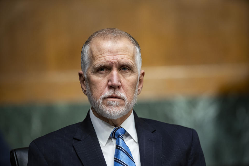 Sen. Tom Tillis, R-N.C., listens as Federal Reserve Chair Jerome Powell and Treasury Secretary Steven Mnuchin, not pictured, testify during a Senate Banking Committee hearing on Capitol Hill, on Tuesday, Dec. 1, 2020, in Washington. (Al Drago/The New York Times via AP, Pool)