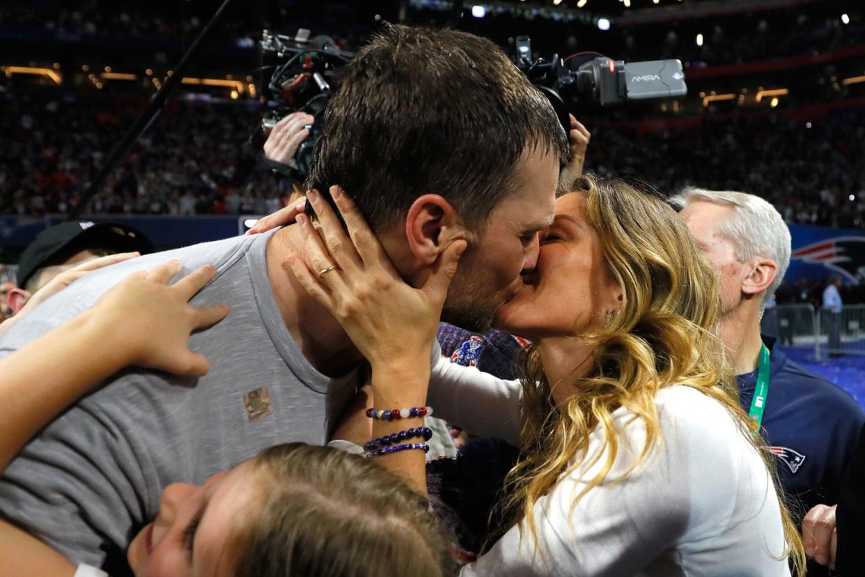 Proud: Tom Brady #12 of the New England Patriots kisses his wife Gisele Bündchen: Getty Images