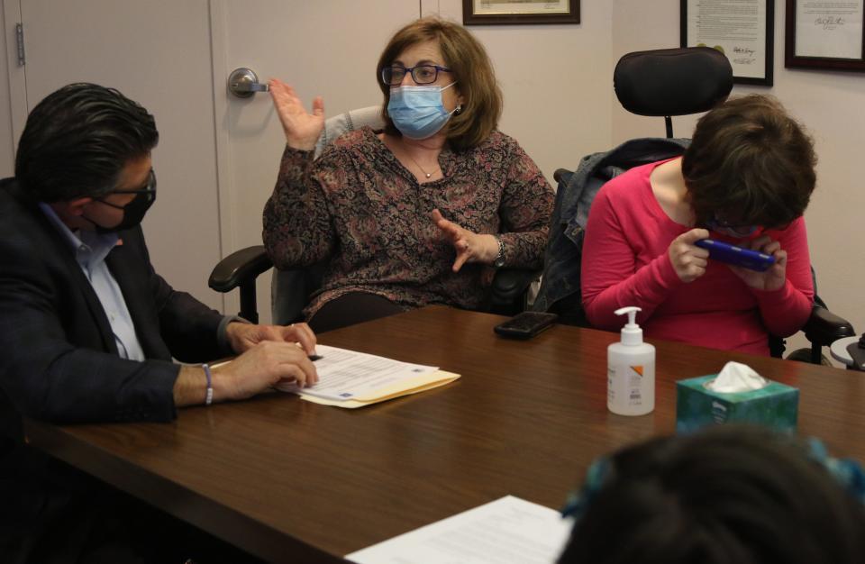 Families of disabled adults meet with state Sen. Tony Bucco Jr. at his Denville, N.J., office March 30 about critical programs including therapy that are still closed after a year of the pandemic.