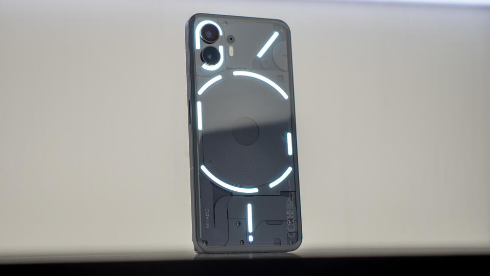 Nothing Phone (2) with its back Glyph lights illuminated