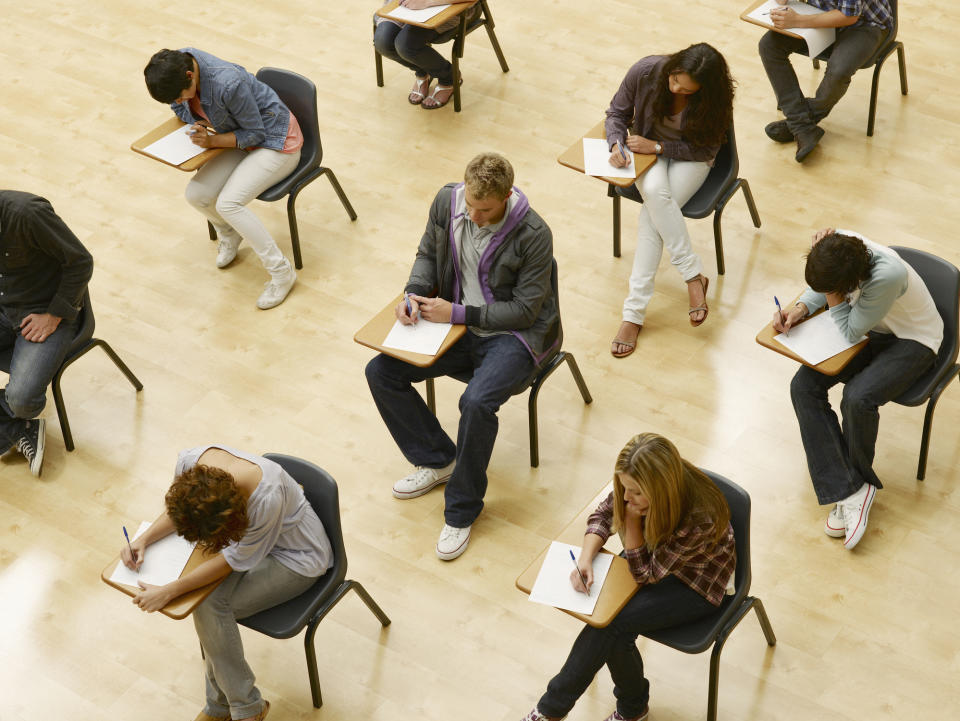 rows of students taking a test