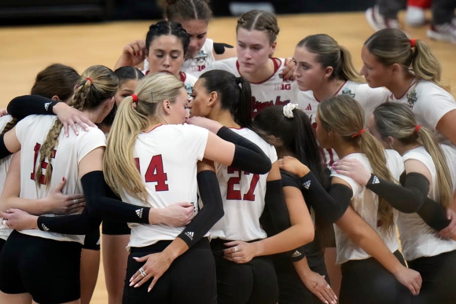 Nebraska players react after the team lost to Texas during the championship match in the NCAA Division I women’s college volleyball tournament Sunday, Dec. 17, 2023, in Tampa, Fla. (AP Photo/Chris O’Meara)