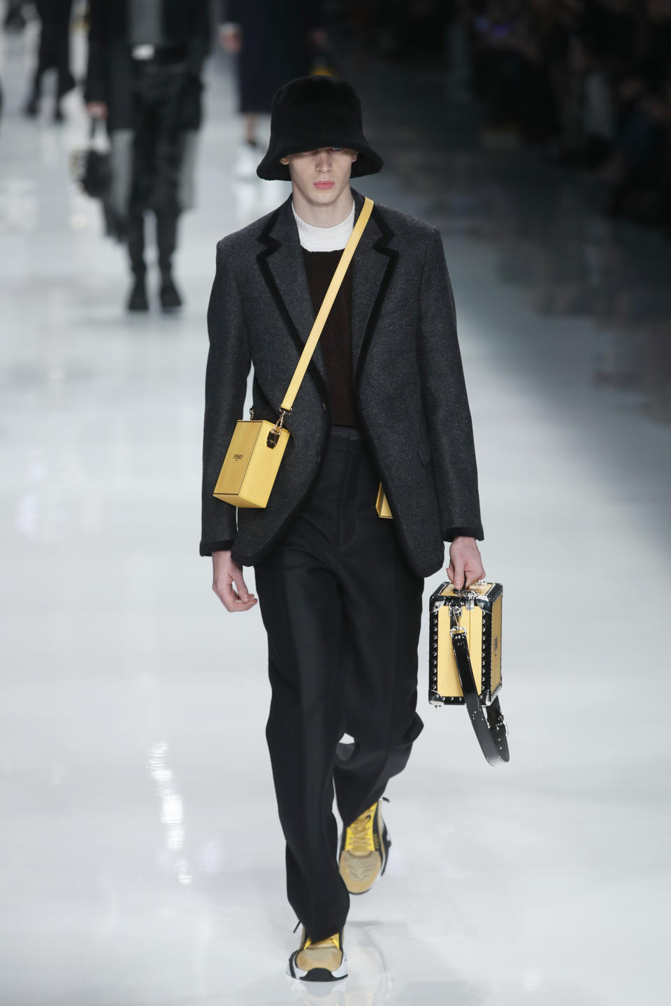 A model wears a creation as part of the Fendi men's Fall-Winter 2020/21 collection, that was presented in Milan, Italy, Monday, Jan. 13, 2020. (AP Photo/Antonio Calanni)