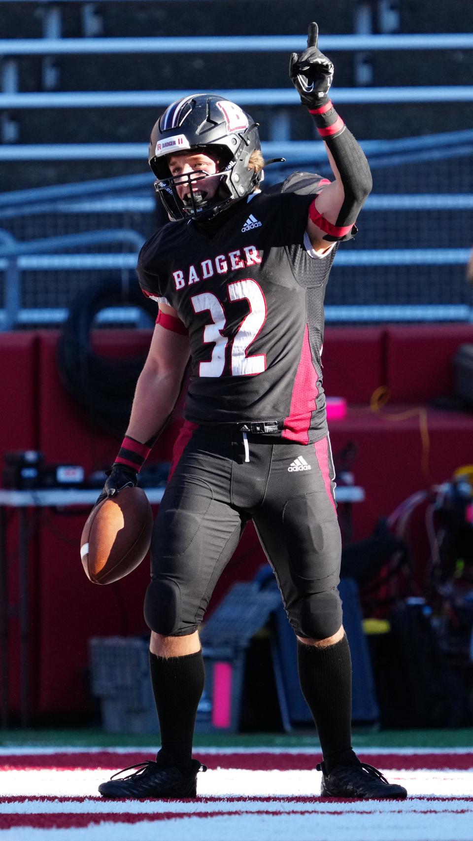 Badger's Landon Nottestad celebrates a touchdown during the WIAA Division 2 state championship game against Waunakee at Camp Randall Stadium.