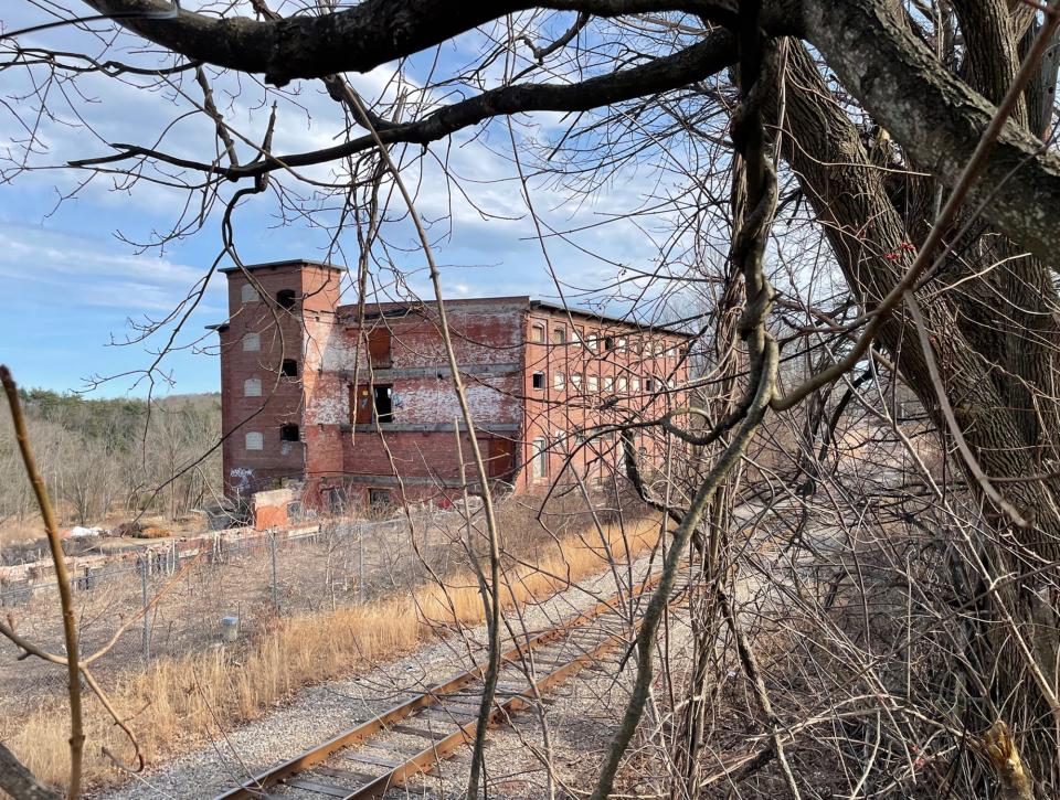 The former Great Falls Bleachery and Dye Works mills in Somersworth still stands but some parts of the structure were destroyed by fire in 2019. Developer Eric Chinburg plans to create 145 housing units on the property.