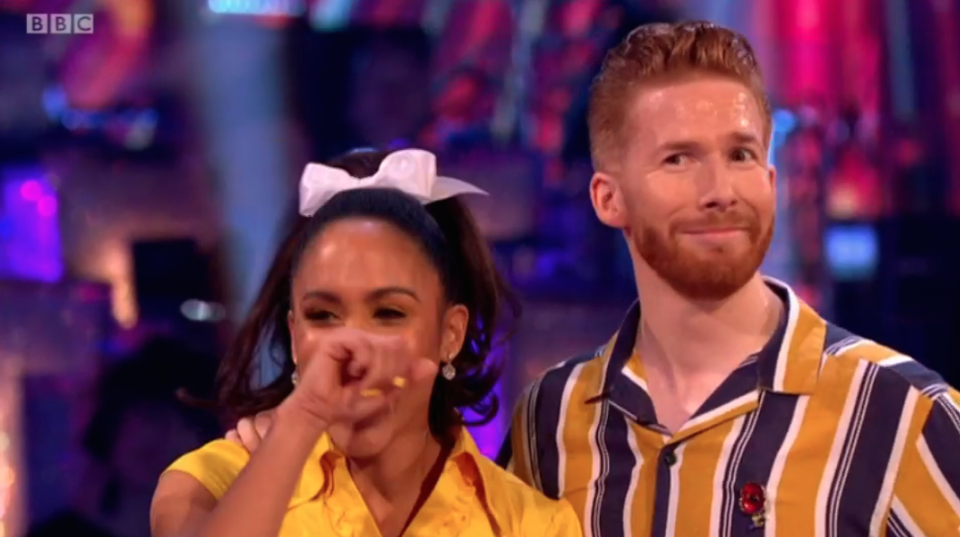 Giggles: Alex Scott broke out into fits of laughter and Neil Jones looked shocked